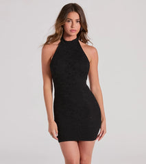 Step into winter chic with the Poised Perfection Halter Open Back Lace Mini Dress, a black mini dress featuring an above-the-knee cut ideal for cocktail parties, festive gatherings, or clubwear.