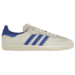 Adidas Samba Humanrace Navy Aluminum sneakers i vinklet profil med marineblå læderoverdel, matchende snørebånd og karakteristisk gummisål