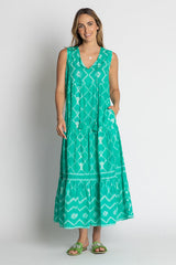 A model wearing the Kumo Cotton Maxi Dress in colour Sea (Green), from the front, showing the whole outfit