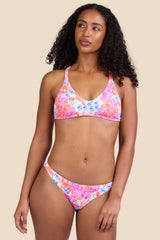 Female model wearing the Women's Kelia Bikini Bottom in the Orchids Ribbed print, standing in front of a yellow background shown from the front view

|| Size S, Hips 37"