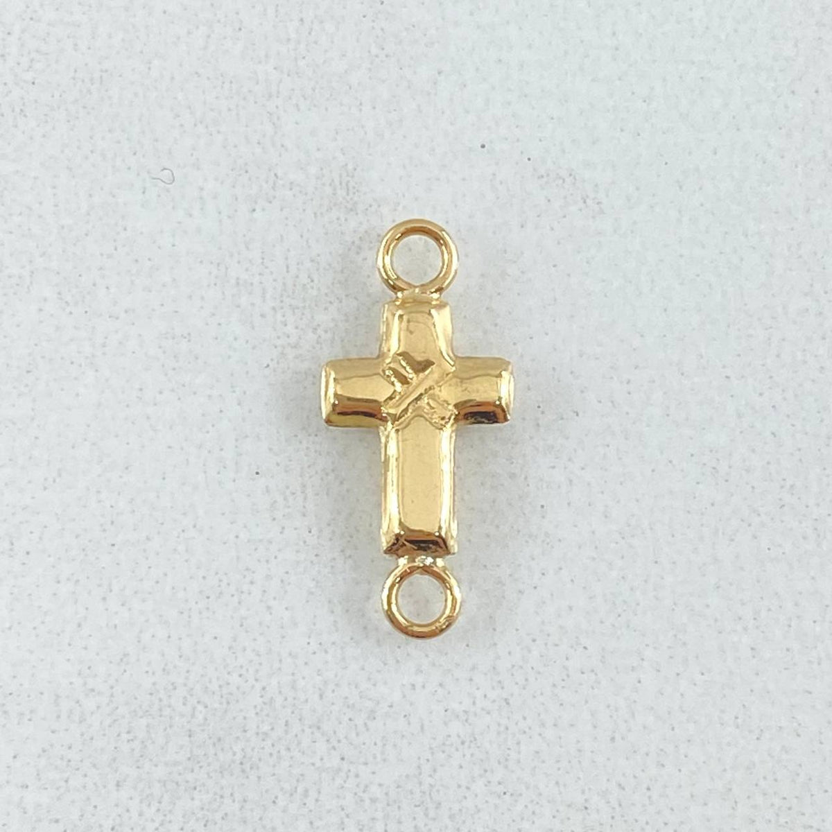 Herraje Crúz 0.4gr / 1.6cm / Oro 18K