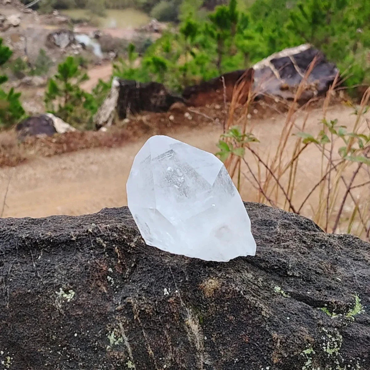 This is the front side of this single Quartz crystal point outside in natural light