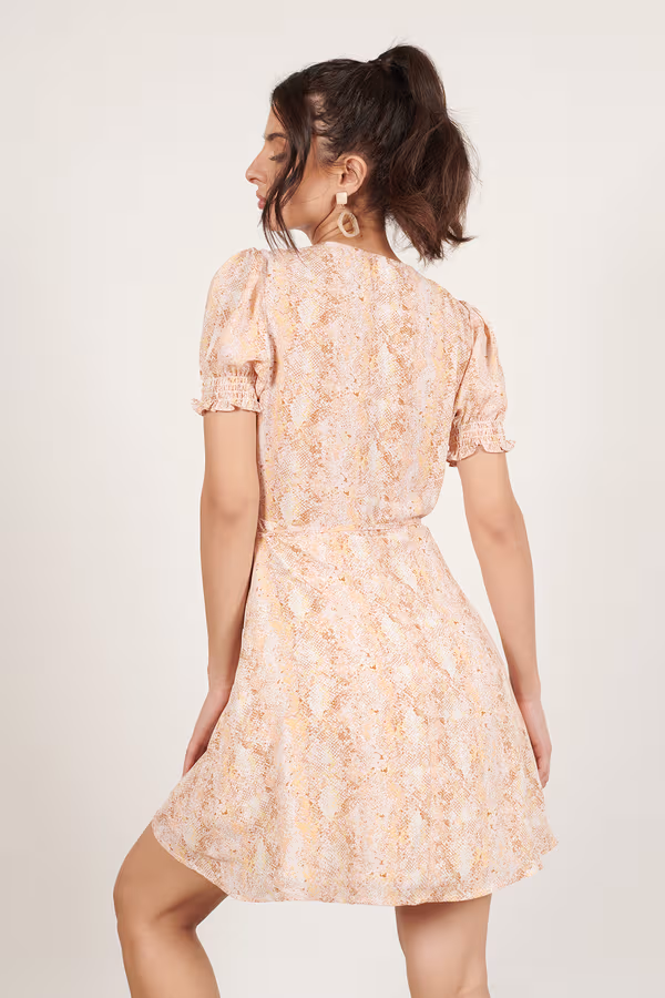 Matter Of Time Snake Wrap Mini Dress - Blush Multi